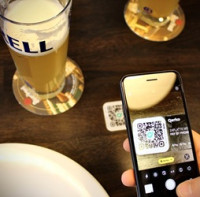 Platit Qerkem za útraty v hospodách bude možné na více místech